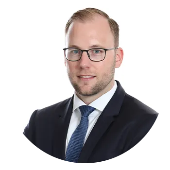 Porträtfoto von Notar Philip Scholz